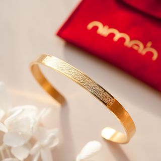 'Patience is key' engraved Arabic gold bracelet in cuff design